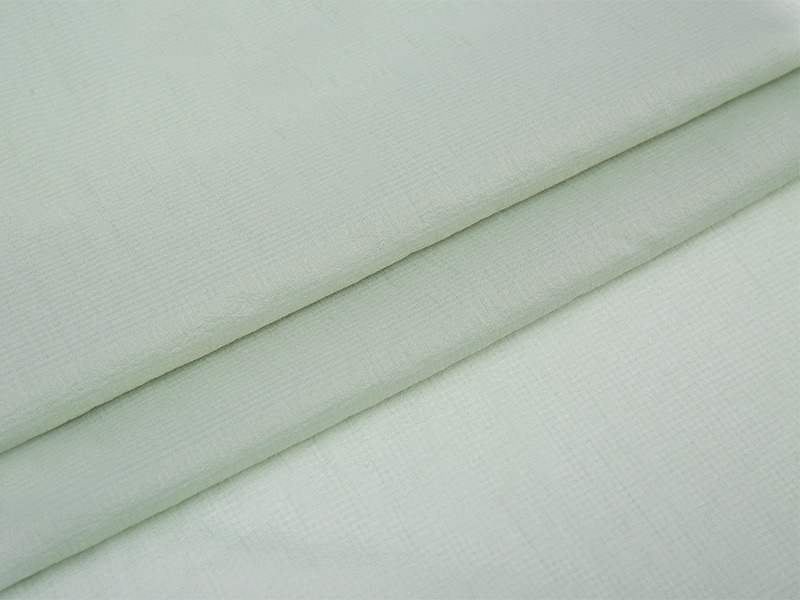 Hvordan forbedrer polyester -sammenhængen komforten ved tøj gennem åndbarhed?